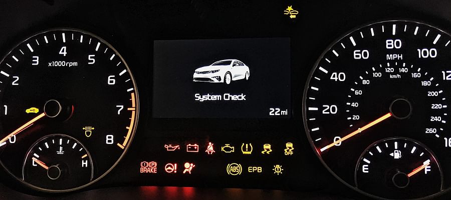 Illuminated car lock symbol on vehicle dashboard